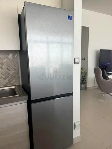 Hitachi new model fridge bottom freezer inverter good condition.