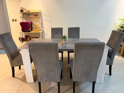 Modern grey 6-seater dining table set with upholstered chairs