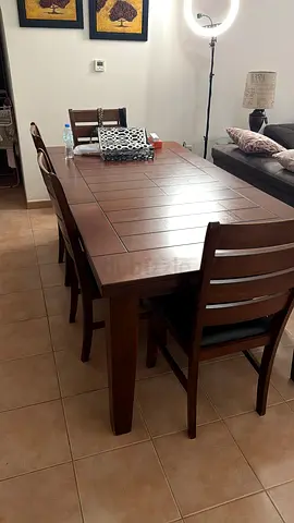 Wooden dining table with 6 chairs - solid finish, good condition