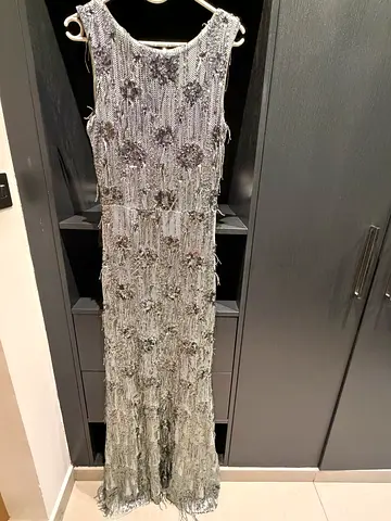 Maxi sequin evening down with fringes and draped open back