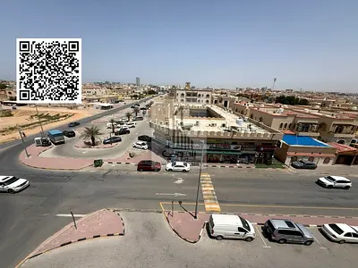 Spacious one-bedroom apartment with a living room, located at the Dubai-Sharjah exit.