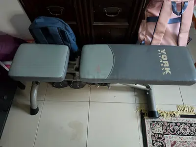 York Fitness adjustable workout bench with bumbells - used