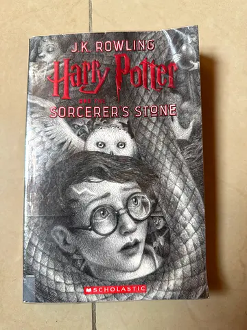 Harry Potter and the Sorcerer's Stone by J.K. Rowling (Paperback)