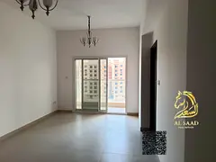 For Sale Large Studio in Al-Amira Village, Balcony + Separate Kitchen.