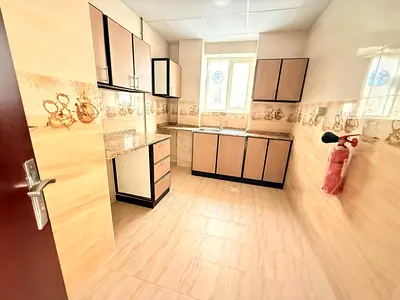 NO DEPOSIT CASH 1BHK LIKE BRAND NEW BUILDING IN MUWAILEH
