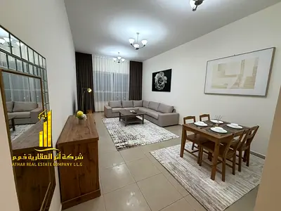 Luxurious 2-bedroom apartment with a living room and sea view in Ajman (Corniche – Al Fazzan Tower); furnished and available for monthly rent.
