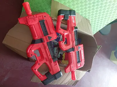 Pair of red Fortnite Nerf-style toy blasters - used