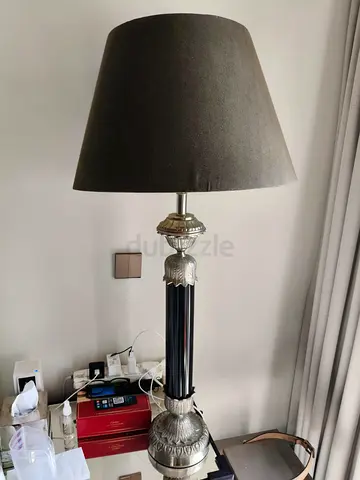 Tall Decorative Floor Lamp with Dark Shade and Ornate Metal Base from marina furniture