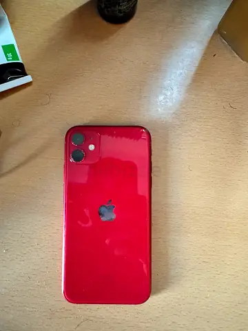 Red iPhone (looks like iPhone 11) in very good  condition