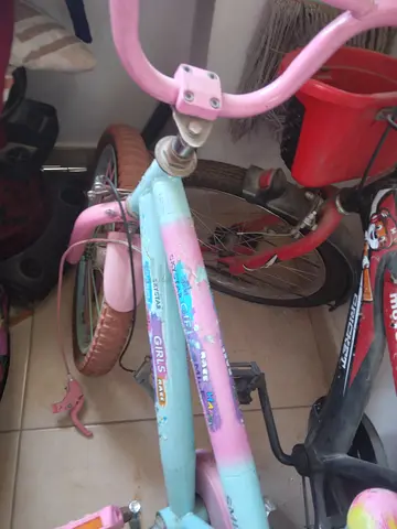 Pink and light blue cycle available for urgent sale suitable for girls and boys