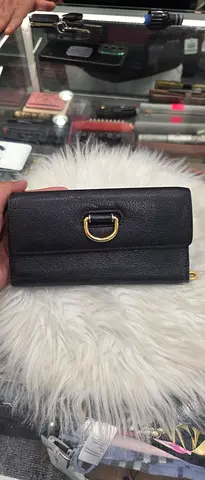 Black leather compact wallet with gold D-detail (pre-owned)