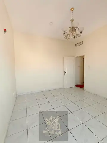 Spacious 1BHK with Covered Parking and Free AC in Al Majaz 2