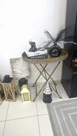 Small round decorative side table with gold frame and tray top