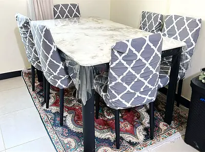 6-Seater Dining Table with Marble Top and Cushioned Chairs