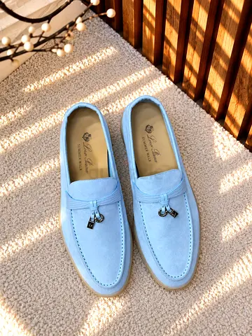 Light blue suede men's loafers — size not specified, hardly worn