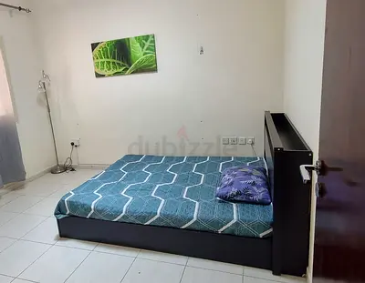 Queen size bed with mattress and headboard storage.