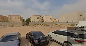 Residential and commercial land for sale in Al Mowaihat 1, Ajman, directly behind Nesto. 6,000 sq. f