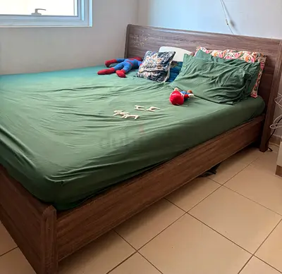 Queen wooden bed frame with headboard - good condition