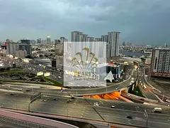 2-Bedroom Apartment for Sale in Conquer Tower, Ajman | Open City and Creek View, 100% Freehold for A
