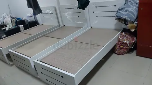Single white wooden bed frame with slatted headboard (used)