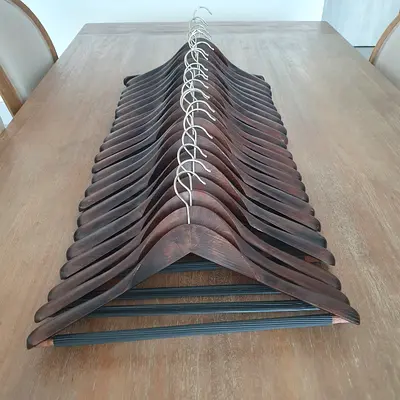 25 Wooden High Quality Hangers with Non-Slip Bar - Dark Wood. Medium size.