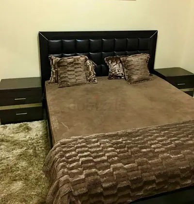 King size bed (internal storage)with leather headboard with 2 bedside tables and dresser with mirror