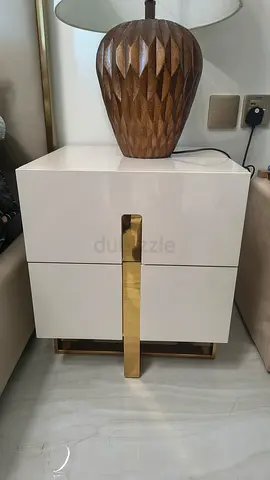 Modern beige bedside table with brass accents - excellent condition