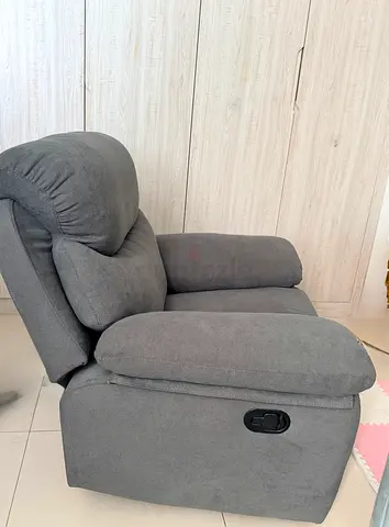 Grey fabric single-seater swinging recliner chair - good condition