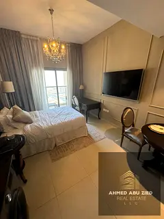 Luxury Studio fully furnished for annual rent at Azha Garden Residence - Ajman. balcony with an open