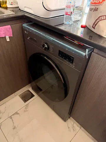 Front-load washing machine - good condition, 9kg (silver)