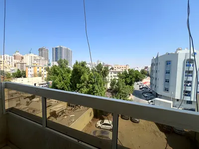 Spacious 2BR in Al Nuaimiya 2, Ajman | Master Bedroom | Balcony | Central AC | AED 31K