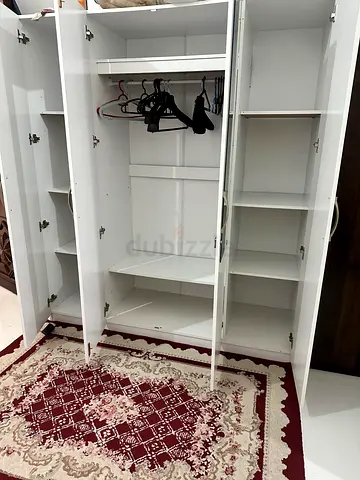 White 3-Door Wardrobe with Shelves and Hanging Rail - Good Condition