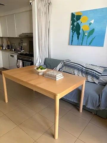 Extandable Light wood dining table - solid, good condition