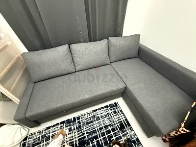 IKEA Grey L-shaped corner sofabed with chaise - good condition