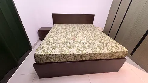 Moving out sale: King size wooden bed with side table