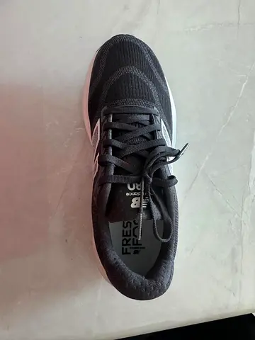 New Balance women's black running shoe - lightly used, size unknown