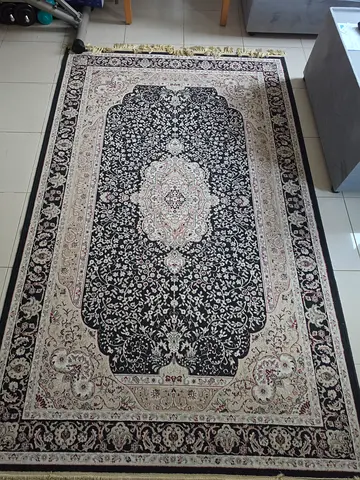 Black & beige Persian-style area rug, good condition