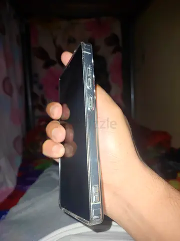 Used Samsung Galaxy smartphone with clear case - good working condition with 11 month warranty