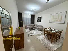 Luxurious 2-bedroom apartment with a living room and sea view in Ajman (Corniche – Al Fazzan Tower