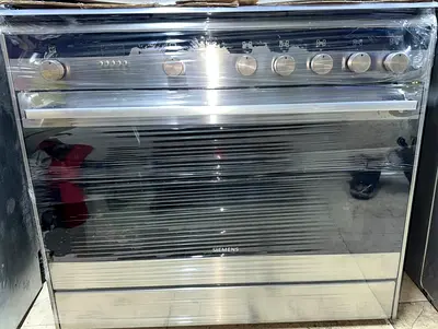 Siemens stainless steel freestanding cooker with oven and hob