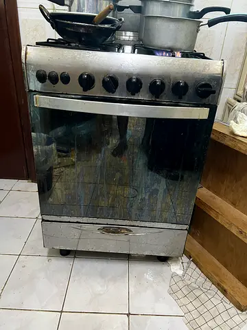 Used freestanding gas oven and stove - functional, needs cleaning