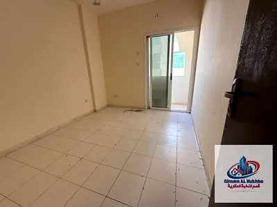 Near beach! Spacious 1BR for rent in Al Qulaiaa. Central AC & gas, excellent price, easy payments. Prime location with easy Dubai exit.