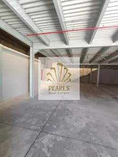 Large Warehouse with Mezzanine for Annual Rent in Al Jurf 2 Industrial Area, Total Area 11,550 Sq. F