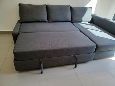 Grey L-shaped Sofa Bed with Storage - Good Condition