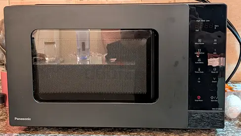 Panasonic Countertop Microwave Oven -flawless Condition worth around 450 dhs now