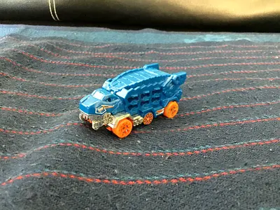 Hot Wheels 1:64 Ultimate T-Rex Transporter Diecast Metal Model