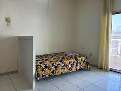 Spacious and Well ventilated Room with Balcony for Rent in Abu Shagara.