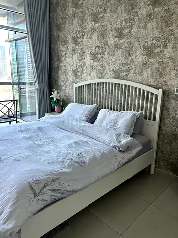 White Wooden Bed Frame and 1 side table