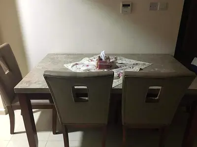dining table with 6 upholstered chairs - good condition