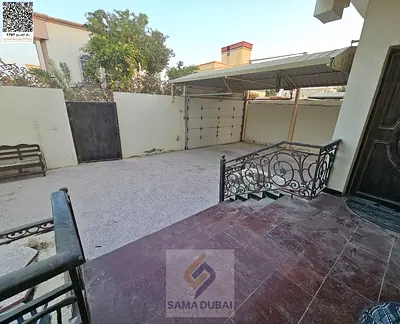 Villa for sale in Al Muwaihat 3, Ajman | 5 master bedrooms + majlis + living room + kitchen + maid's room + garage | Area 3,014 sq ft | Price includes